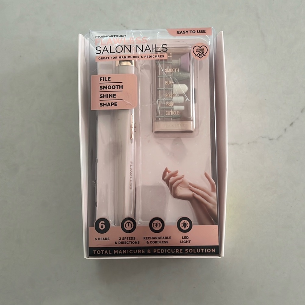 Flawless salon nails, open box but never used.